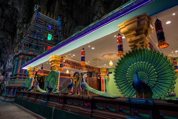 Hindu Temple inside the cave. Batu Caves, Malaysia. Batu Caves are located just north of Kuala Lumpur. The cave is the focal point of Hindu festival of Thaipusam in Malaysia.