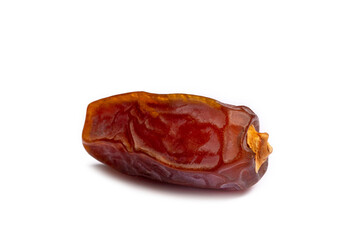 Dried date palm fruits in wooden bowl on white background