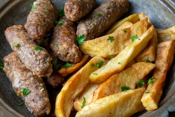 Traditional Turkish food; dry meatballs or inegöl meatballs with potatoes (Turkish name; Kuru kofte or anne koftesi)