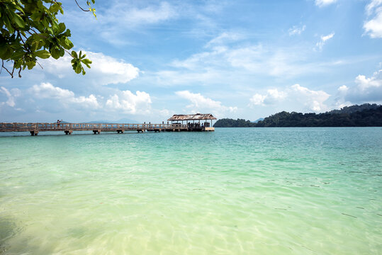 Jetty at Pulau Beras Basah, Langkawi, Malaysia. - The beautiful scenery of long Jetty with clear blue sky and water, Pulau Beras Basah Island, Langkawi, Malaysia.