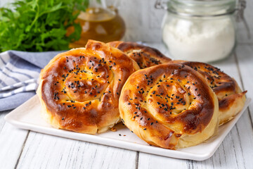 Traditional delicious Turkish phyllo stuffed with spinach, cheese (Turkish name; Gul borek or gul boregi) Rose shaped pastry.