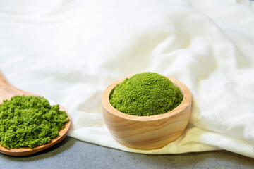 Wolffia globosa in wooden bowl. Wolffia is the nutrient-rich plant-based source of protein and...