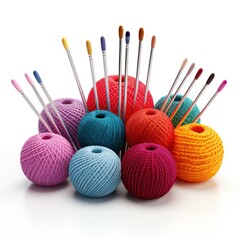 Colorful knitting needles and yarn balls isolated on white