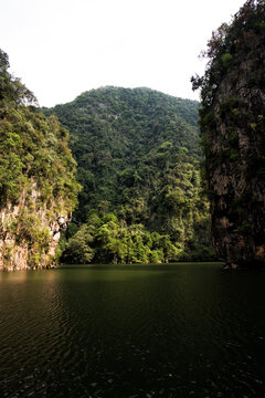 Tasik Cermin or Mirror Lake, Ipoh, Malaysia - Tasik Cermin, or Mirror Lake, is a stunning hidden lake surrounded by limestone karst towers. Located near Ipoh town, Perak state, Malaysia.