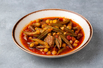 Traditional delicious Turkish cuisine. Locally cooked okra dish. Turkey Adana style meat okra dish. Turkish name; etli bamya yemegi.