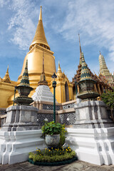 Fototapeta premium Phra Siratana Chedi at Grand Palace in Bangkok, Thailand - This golden, bell-shaped stupa on the upper terrace of Wat Phra Kaew is the tallest structure
