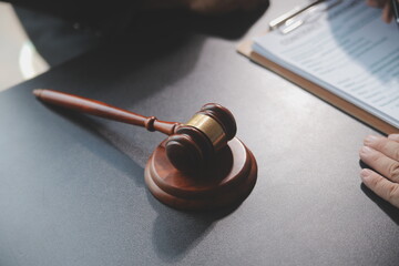 Obraz premium Customer service good cooperation, Consultation between a Businessman and Male lawyer or judge consult having team meeting with client, Law and Legal services concept.