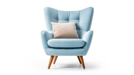 Blue wingback armchair with pillow and wooden feet, isolated on white background.