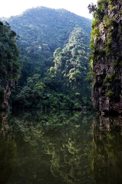 Tasik Cermin or Mirror Lake, Ipoh, Malaysia - Tasik Cermin, or Mirror Lake, is a stunning hidden lake surrounded by limestone karst towers. Located near Ipoh town, Perak state, Malaysia.
