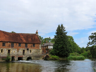 Fototapeta na wymiar The old Mill Harnham Salisbury Wiltshire on the River Avon 