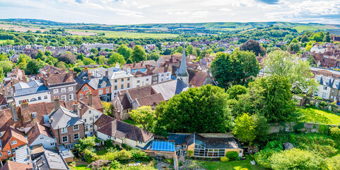 A panorama view south along the High Street from the ramparts of the castle keep in Lewes, Sussex, UK in summertime