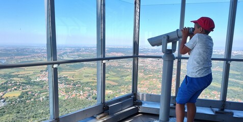 person looking through window