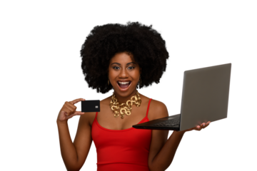 a woman with a laptop holds a black credit card and smiles enthusiastically, white background