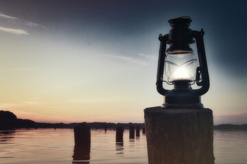 Old Lantern at Sunset -  Beautiful -  Sky - Background - Lamp - Glow - Seaside - Beach - Kerosene -  Lake - Burning - Vintage - Oil - Travel - Wooden - Rusty - Stake  - Water - Öllampe - Abendstimmung