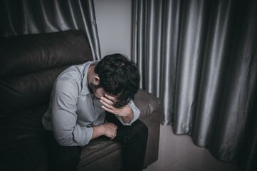 Asian handsome man stress from work overload,Tired male come back home after a lot of work from company,risk of depression