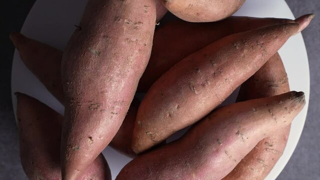 Raw Sweet Potatoes spinning around in a plate