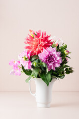Bouquet of red and pink dahlias.