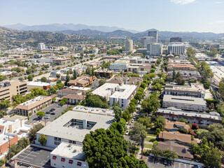Glendale, California – September 9, 2023: drone view toward Glendale CA with 134 freeway and Glendale downtown buildings, apt, houses, homes