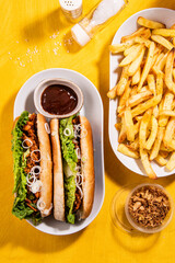 American  buns with torn meat, vegetable and pomme frites in the fast food restaurant - 646951954