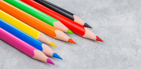 colored sharp pencils red, blue, yellow, green