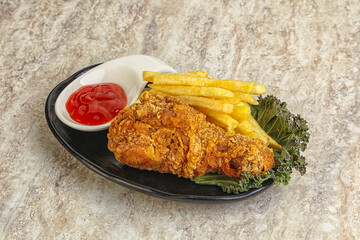 Crispy chicken leg with fry potato