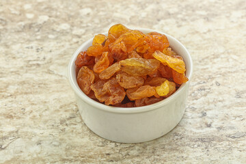 Sweet yellow raisin in the bowl