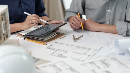 Asian Architects designer team working together meeting in startup office..