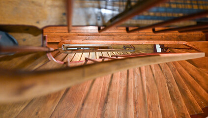 Fascinating view of a wooden staircase of a Paris period house. Vintage style, Parisian charm.