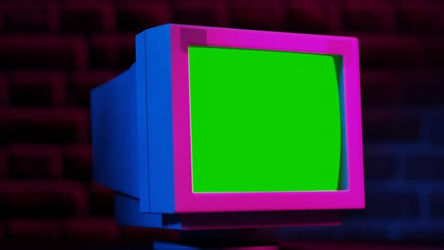 Close Up Footage of a Dated computer with Green Screen Mock Up Chroma Key Template Display. Nostalgic Retro Nineties Technology Concept.