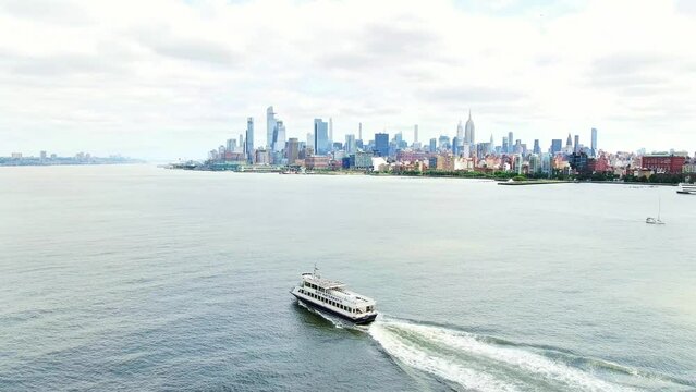 Drone NYC. Ferry to upper Manhattan. Aerial view downtown New York city. urban life, modern city in America.  