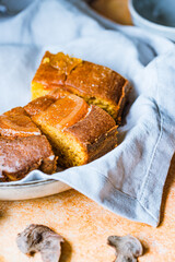 Three slices of orange Cake in a basket