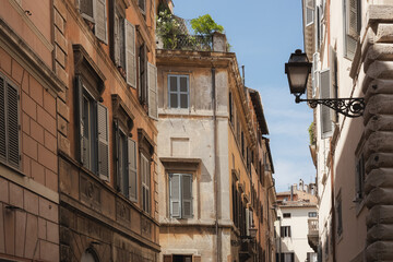 Traditional residential buildings and architecture in Rione VI Parione in central old town of historic Rome, Italy.