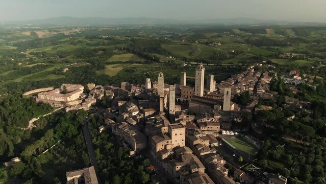 Aerial of historic San Gimignano skyline and city center in Tuscany, Italy 5