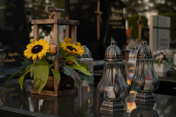 Sunlowers and gravelight on the tomb.