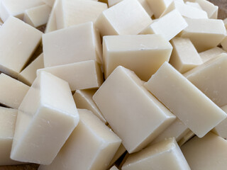 white natural olive oil soap background , Natural soap cut equally in a rectangular shape, healthy life concept