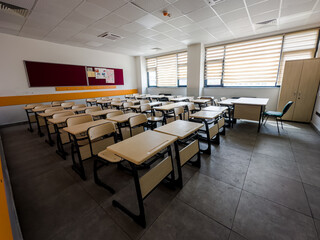  Classroom in background without ,No student or teacher . modern classroom environment , located name is osym