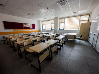  Classroom in background without ,No student or teacher . modern classroom environment , located name is osym
