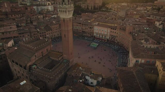 Aerial of old town Siena skyline and city center at sunset in Tuscany, Italy 4