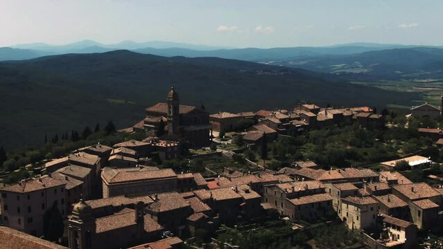 Aerial of historic hilltop castle town in the Tuscan country side, Tuscany, Italy 2