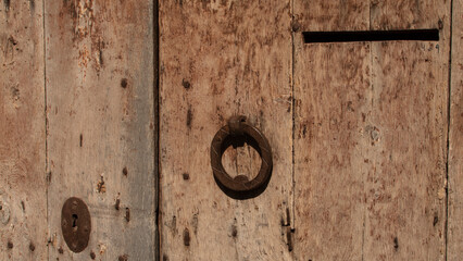 Old metal lock on a very old door