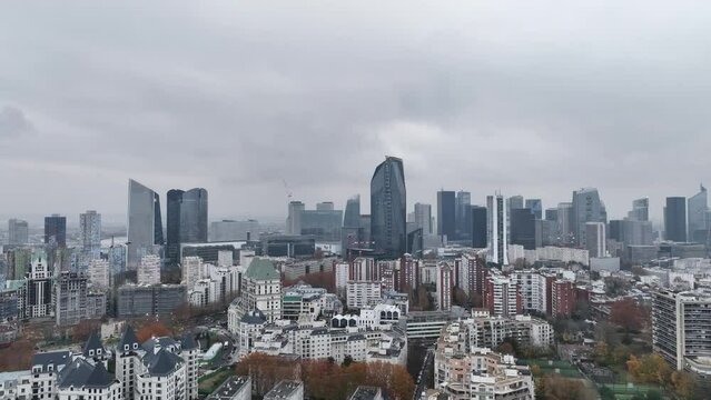 Paris's financial district, La Défense, stretches out beneath the overcast.
