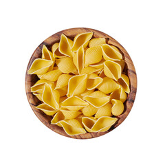 Pasta conchigliei noodle in wooden bowl isolated on white, close up