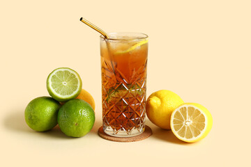 Glass of cold Long Island iced tea on light background