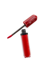 Bright red lipstick with brush on white background