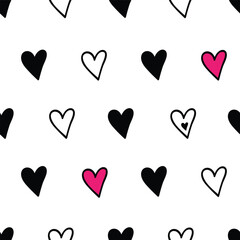 seamless pattern with pink, black and white hearts