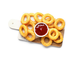 Board with fried breaded onion rings and ketchup on white background