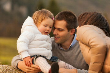 Family bonds amidst mountains, meadows, and woods