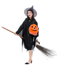 Young Asian woman dressed for Halloween as witch with pumpkin on white background