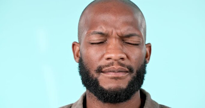 Thinking, confused and face of black man in studio with questions, solution or ask why on blue background. Idea, doubt and portrait of African male model with emoji frown for decision, choice or huh