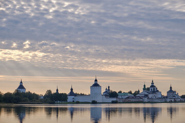 Landscape with a view of an ancient Orthodox monastery and a lake